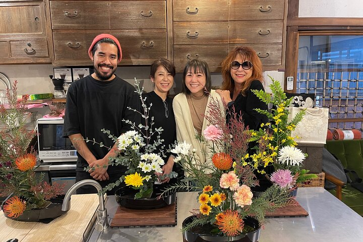 Discover the joy of crafting seasonal Ikebana arrangements with expert guidance surrounded by the charm of Yanaka's local flower shop connecting cultures through art and nature.