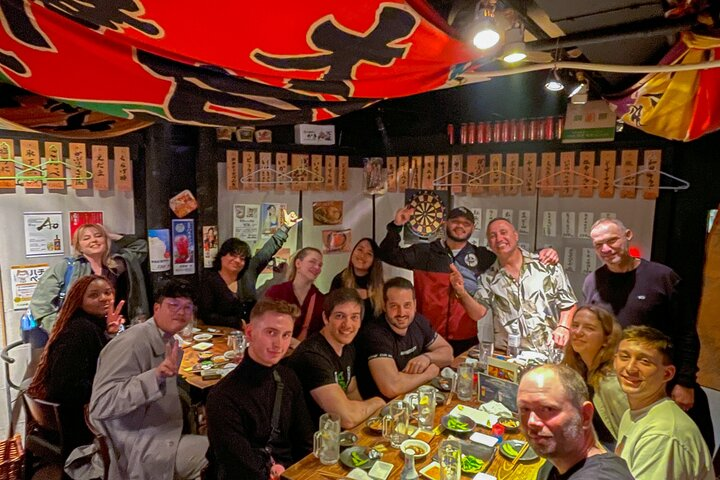 Experience the lively essence of Tokyo’s nightlife as you enjoy unique drinks and share delicious food with fellow adventurers while discovering hidden gems throughout the city’s bars and clubs.