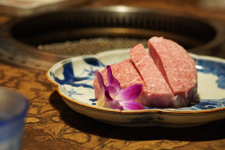 Savor exquisite Japanese cuisine while exploring Asakusa's traditions. Delight in unique flavors stroll through charming streets and capture cherished moments with stunning photos during your journey.