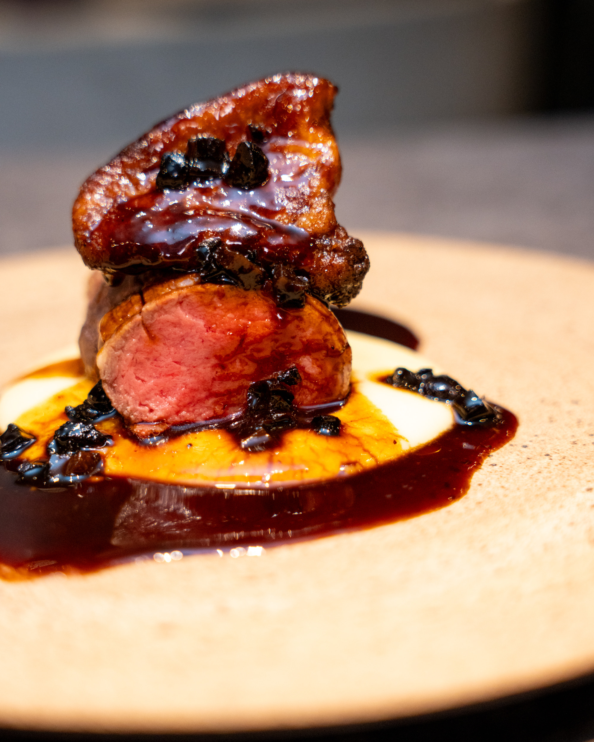 Savor the artistry of wood-fired French and Japanese cuisine where seasonal ingredients meet innovative techniques creating a delightful dining experience perfect for discerning travelers.
