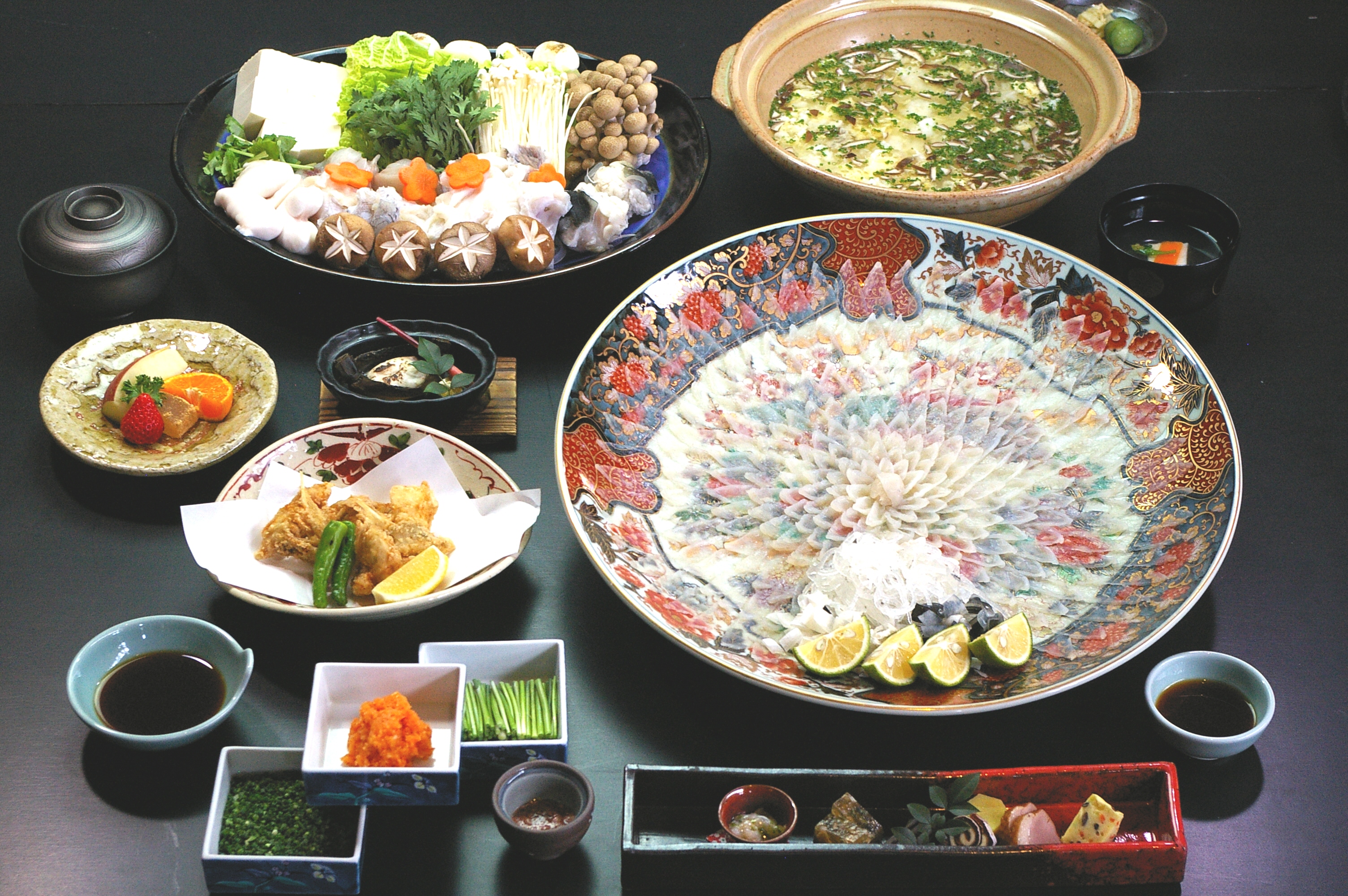 Savor the rich history and exceptional flavors of freshly prepared fugu in a historic setting overlooking the Kanmon Straits. Experience authentic Shimonoseki cuisine at its finest.