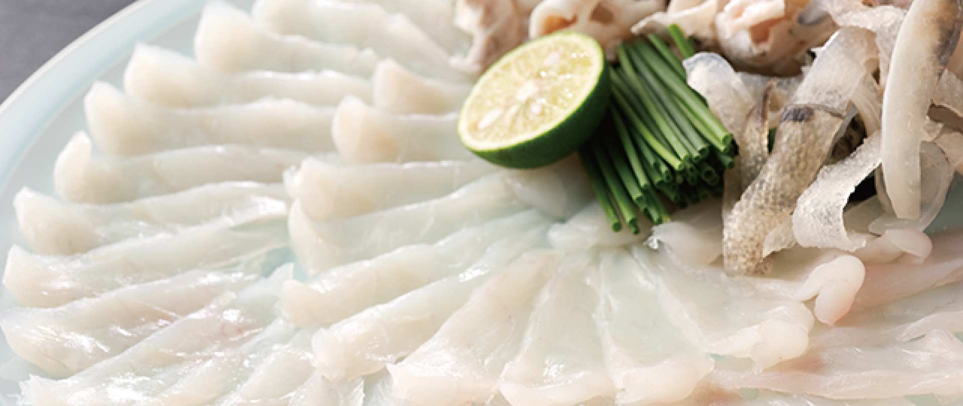 Savor the delicate flavors of natural white tiger puffer fish expertly prepared in Ginza. After a day of exploring indulge in this renowned culinary experience that promises satisfaction.