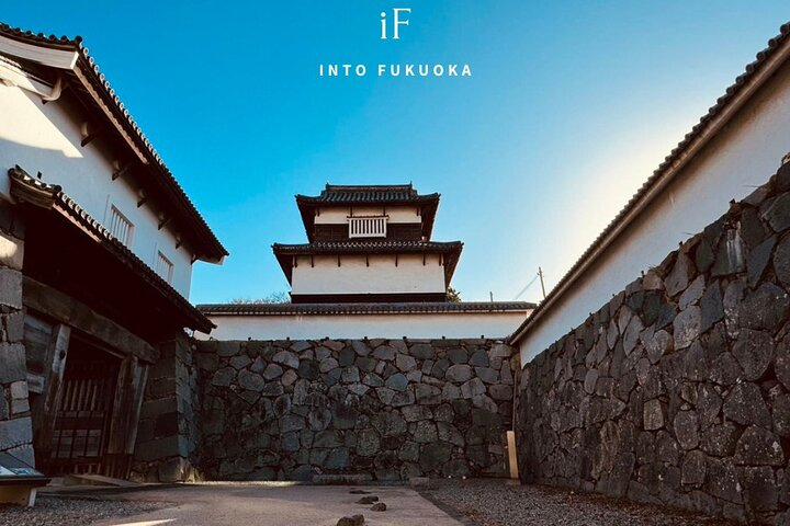 Explore the rich history of Fukuoka Castle and the solemn beauty of Gokoku Shrine surrounded by ancient walls and serene landscapes perfect for immersing yourself in Japan's past.