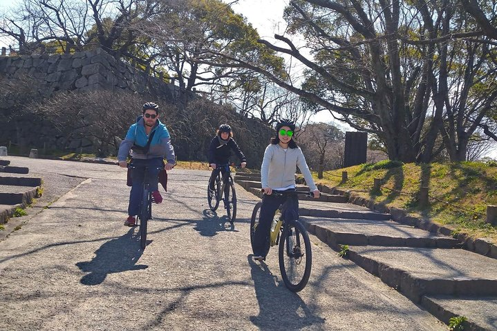 Explore Fukuoka’s rich history on two wheels cycling through ancient castle towns and bustling merchant streets. Enjoy scenic views while savoring traditional castella along the way.