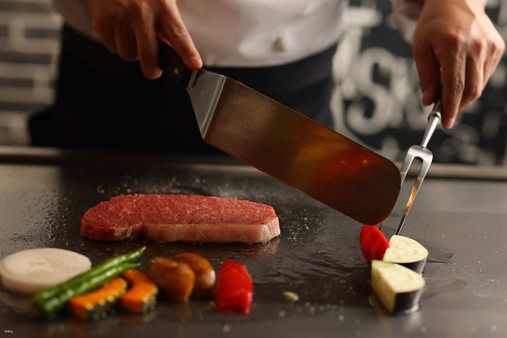 Experience the sizzling preparation of A5 Kobe beef accompanied by fresh seafood and local Kyushu drinks all while immersed in the culinary artistry of teppanyaki in Fukuoka.
