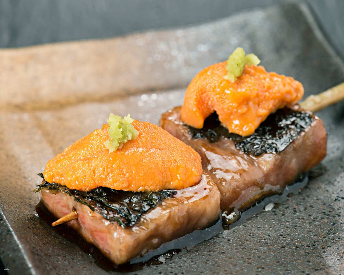 Savor the rich flavors of expertly grilled yakitori featuring top-quality ingredients in a cozy setting just moments from Hakata Station perfect for a taste of Fukuoka's culinary tradition.