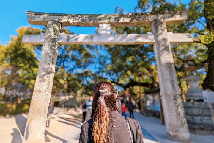 Explore the serene pathways of Dazaifu where ancient shrines and lush greenery invite reflection leading to storied sites rich in history and cultural significance.
