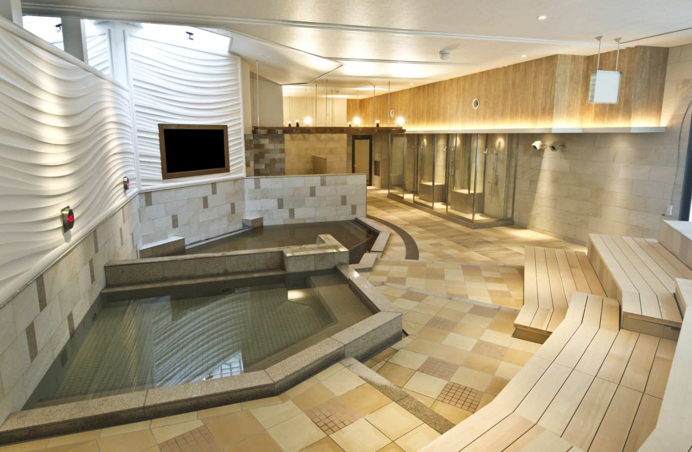 Escape to Heiwajima Hot Springs where soothing waters and serene surroundings invite relaxation. Rejuvenate your spirit in Tokyo's luxurious retreat discovering pure calm amid exquisite design.