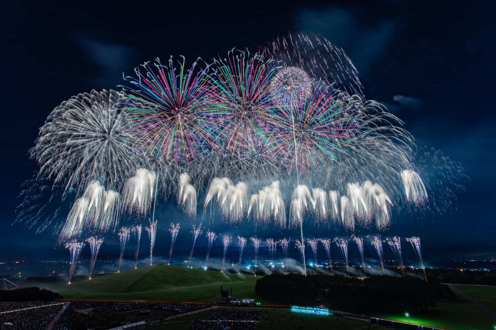 Witness the stunning display of artistry and craftsmanship as Japan's top fireworks makers light up the night sky creating a spectacular experience at the Hokkaido Sapporo City Fireworks Festival.