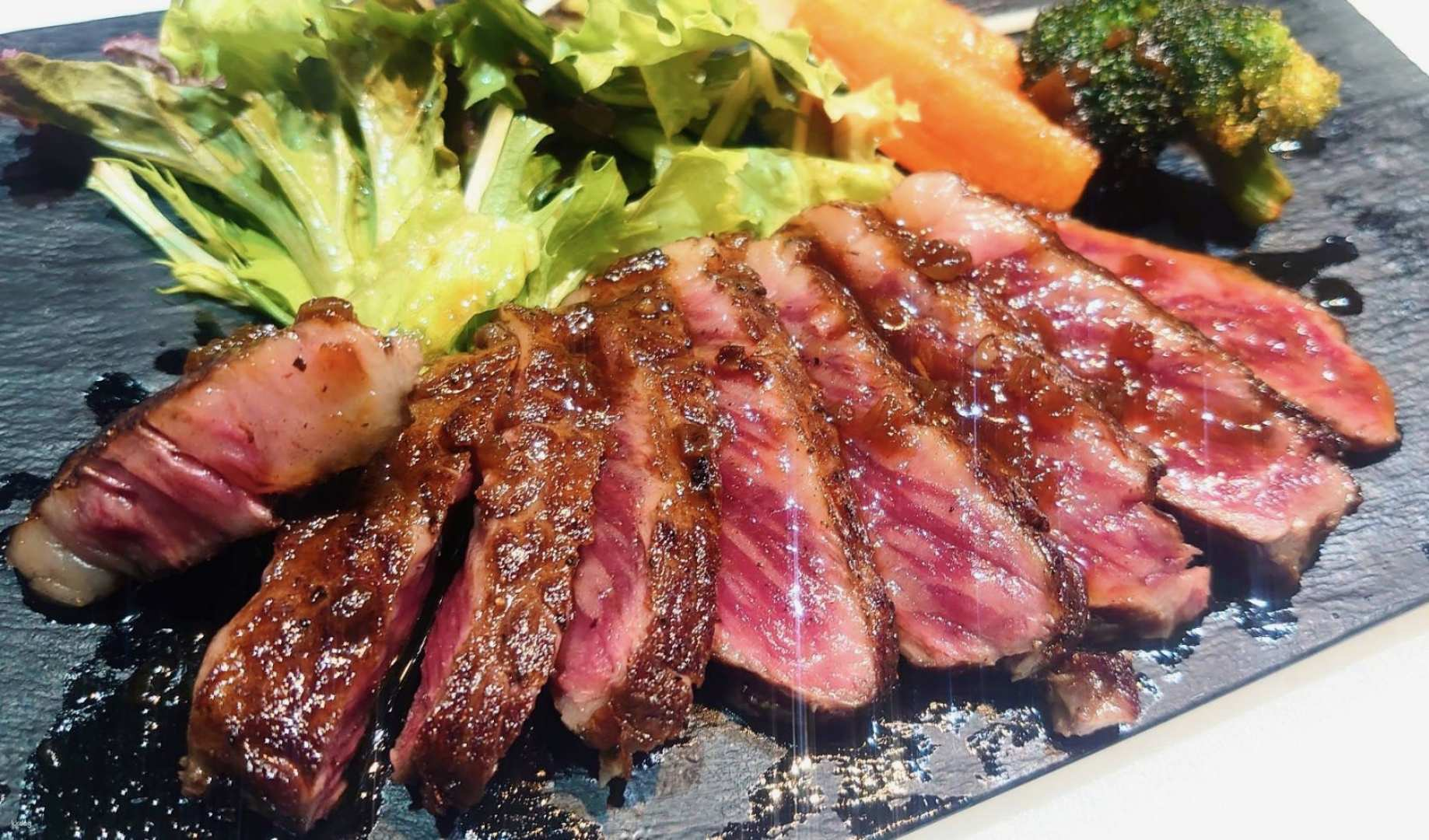 Savor the rich flavors of Hokkaido with expertly grilled wagyu steaks and fresh seafood offering an unforgettable culinary experience that highlights Japan's finest cuisine and local delights.
