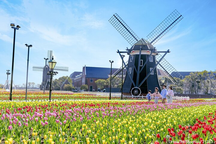 Experience the charm of Huis Ten Bosch with its stunning tulip gardens and iconic windmill perfect for a delightful day of exploration and leisure. Magical moments await at every corner.