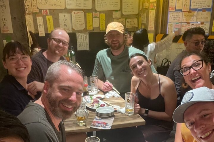 Dive into Fukuoka's izakaya scene surrounded by laughter delicious bites and the warmth of camaraderie. Discover authentic moments and indulge in delightful local flavors with friendly faces.
