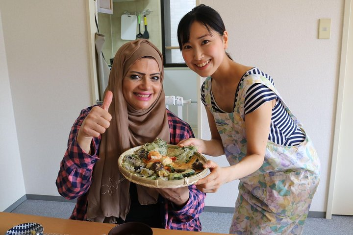 Immerse yourself in Japanese culinary traditions while creating delicious plant-based dishes. Share laughter and experiences in a cozy setting perfect for families and those seeking a local vibe. Enjoy your creations!