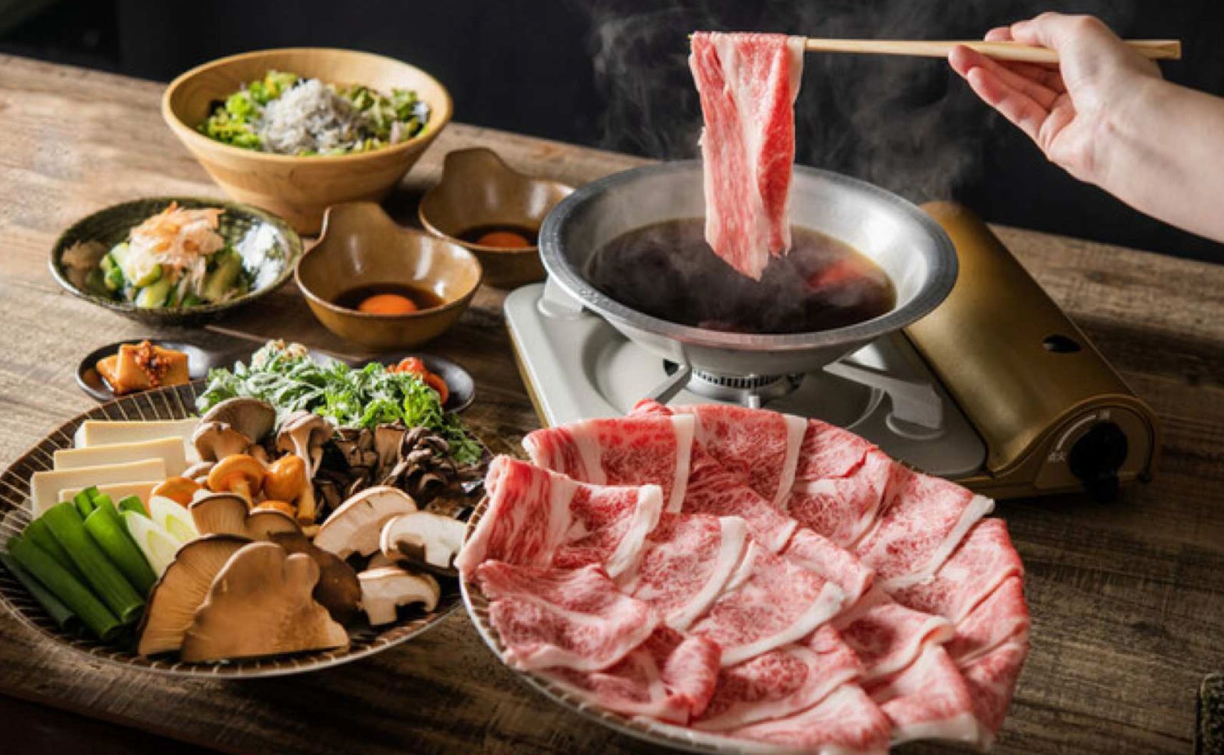 Delight in an authentic izakaya experience where succulent Wagyu beef meets fresh vegetables all enhanced by a diverse selection of Japanese beverages perfect for an unforgettable meal.