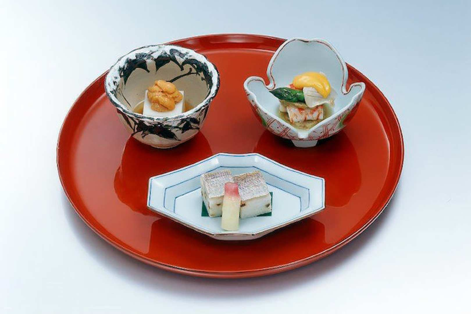 Delight in the exquisite presentation of traditional Japanese cuisine at Genyadana Hamadaya where each dish tells a story of history and culinary artistry in an intimate setting.