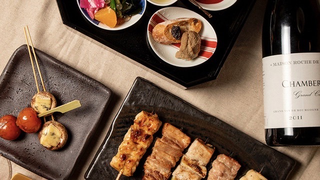 Savor the delight of meticulously grilled yakitori paired with exquisite wines as you indulge in a culinary journey that showcases Japan's local flavors and artistry.