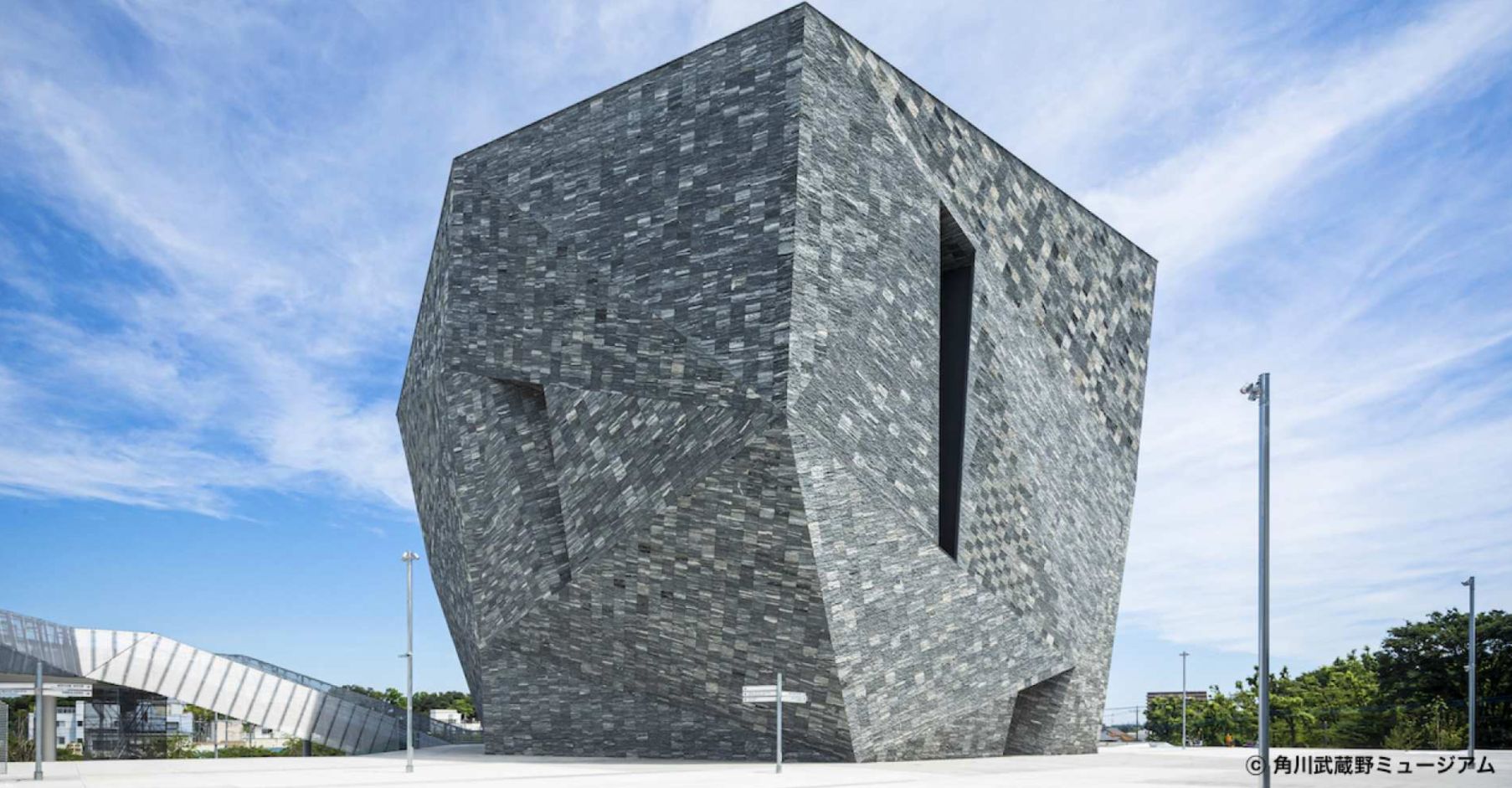 Experience the stunning architecture of the Kadokawa Culture Museum while exploring thought-provoking exhibits and the whimsical Bookshelf Theater amidst the serene surroundings of Musashino Woods Park.