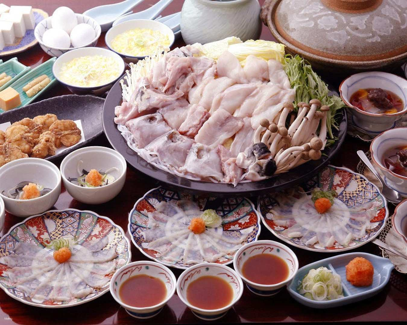 Savor the exquisite flavors of crab and fugu at Kameya Nishi where traditional Japanese dining meets culinary artistry offering an unforgettable culinary journey in Kyoto.