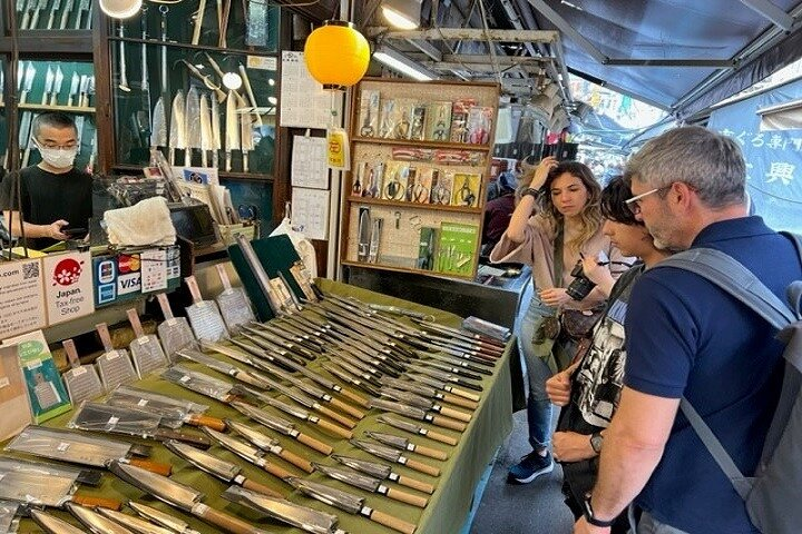Explore the intricate world of Japanese kitchen knives with expert guidance discovering unique shops and craftsmanship that delight culinary enthusiasts in the heart of Tokyo's bustling streets.