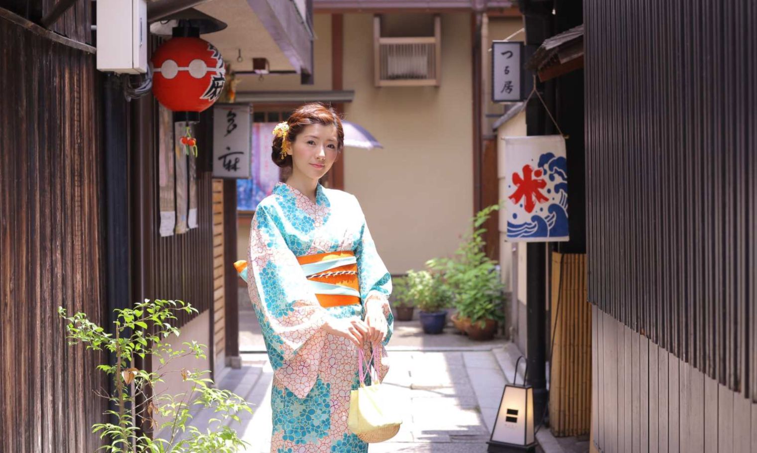 Experience the charm of Kyoto as you explore its traditional streets in a stunning kimono surrounded by historic architecture and the seasonal beauty of cherry blossoms.