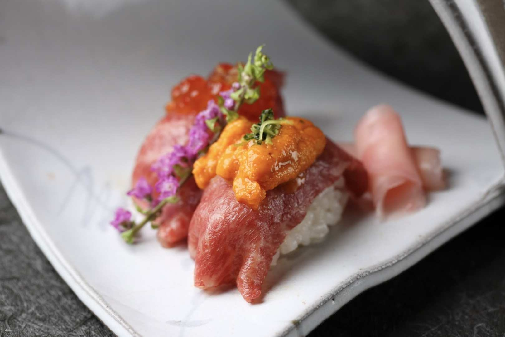 Savor exquisite Kobe and Saga beef in a cozy private setting with stunning views of Osaka's skyline at night. A must-visit for culinary enthusiasts exploring the city's flavors.