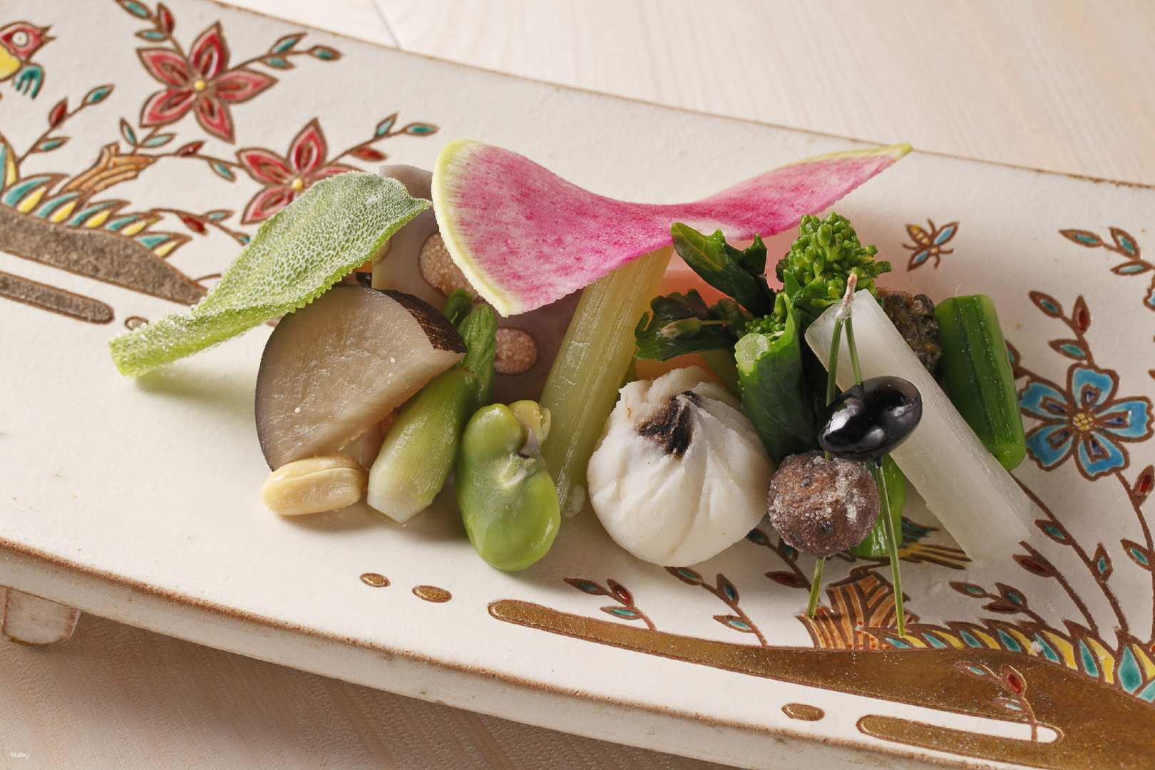 Delight in the artistry of Kyoto kaiseki at Shoebo where seasonal vegetables blend harmoniously showcasing a culinary journey that reflects the essence of local flavors refined with French influences.