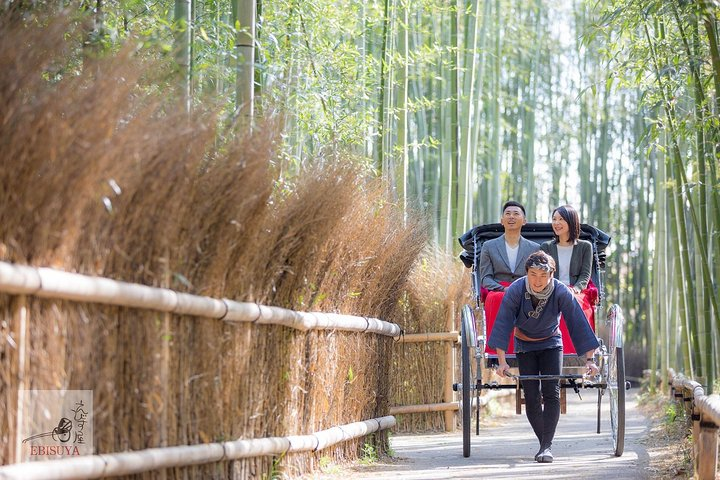 Experience a unique ride through Kyoto’s bamboo groves where traditional rickshaws glide past serene landscapes and historic streets highlighting the charm of Japan's rich cultural heritage.