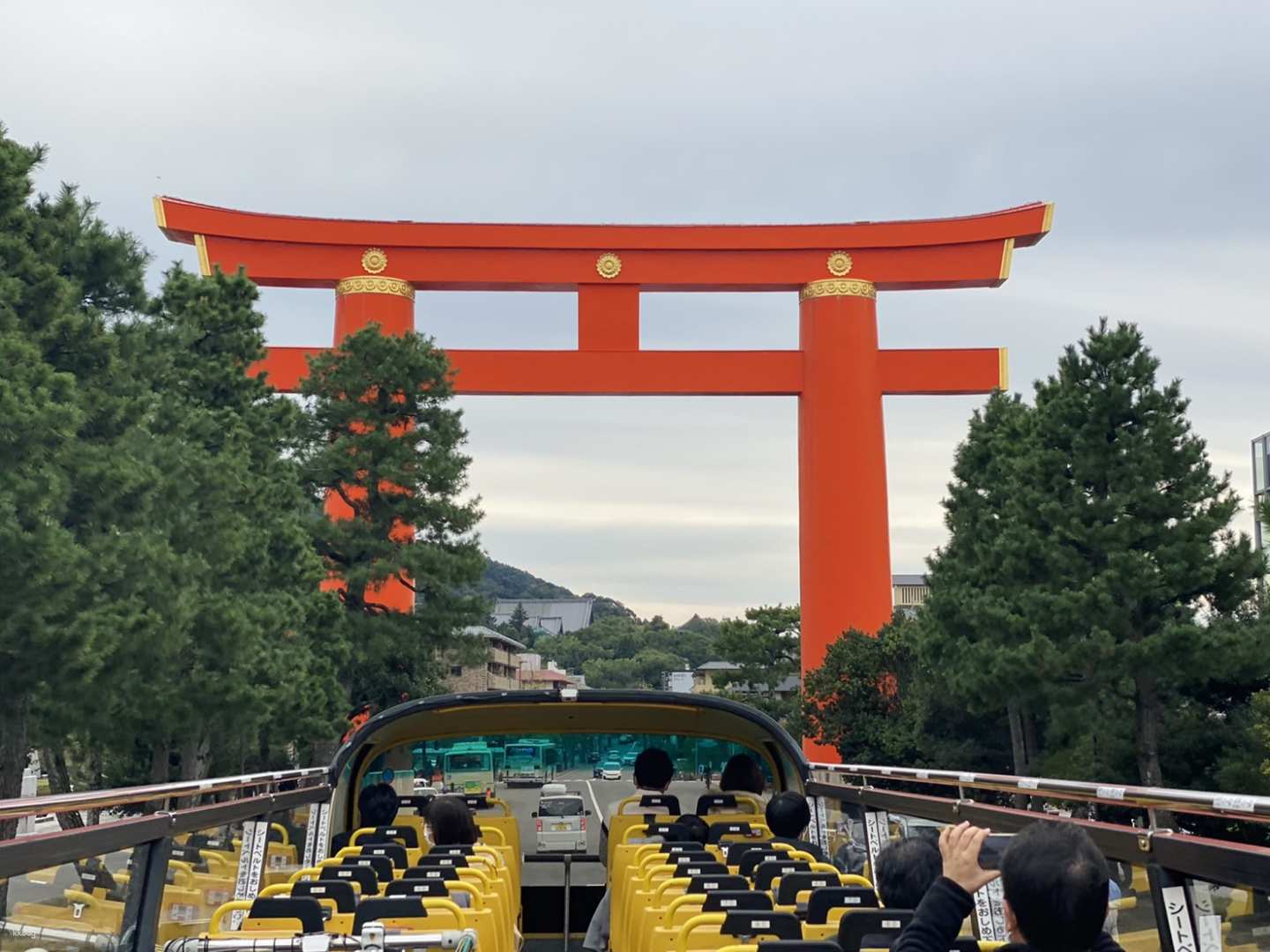 Experience Kyoto's iconic sights from the open-air double-decker bus perfect for hopping between landmarks like Kiyomizu-dera and Kinkaku-ji while enjoying the city's stunning scenery.