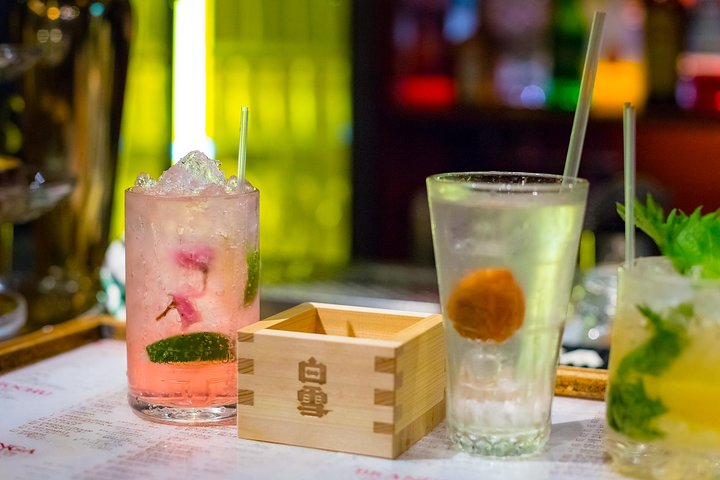 Experience the essence of Tokyo's nightlife with unique cocktails local sake and unforgettable whisky pairings all while exploring hidden gems and enjoying delicious snacks along the way.