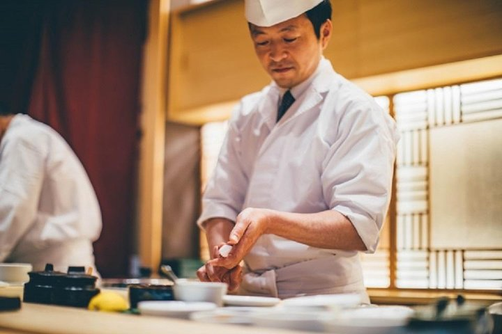 Experience the art of sushi making with a professional chef honing your skills in an authentic setting while discovering the rich culture behind Japan's culinary traditions.