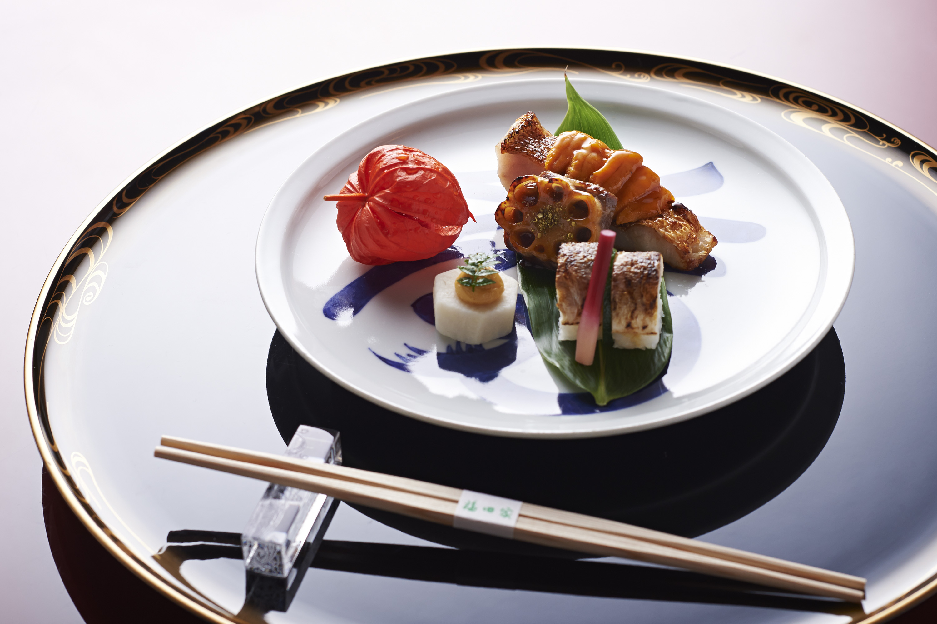 Experience the artistry of two Michelin star cuisine at Kioicho Fukudaya where each dish reflects the legacy of Rosanjin served in an elegant Japanese teahouse setting.