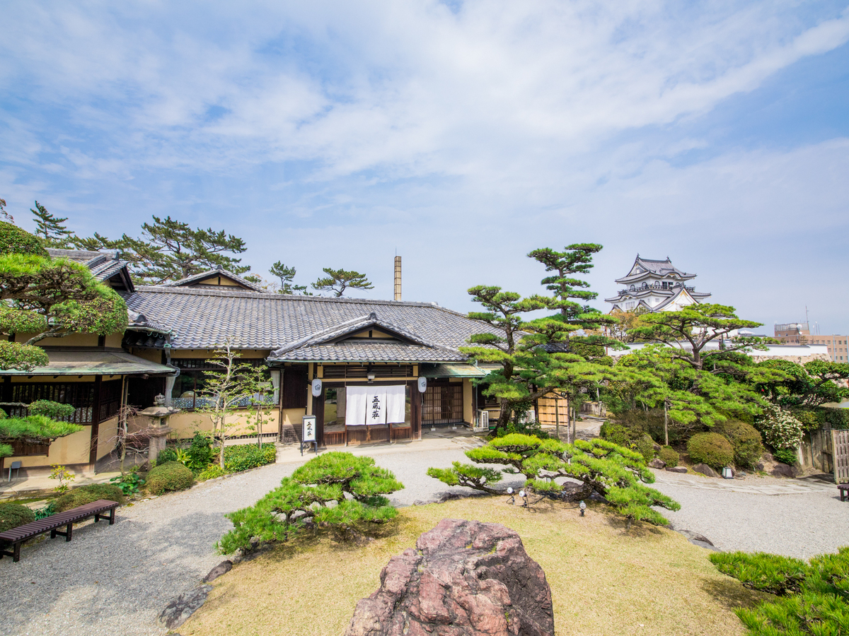 Savor authentic Japanese cuisine while overlooking a beautifully landscaped garden adjacent to the historic Kishiwada Castle where tradition meets modern elegance.