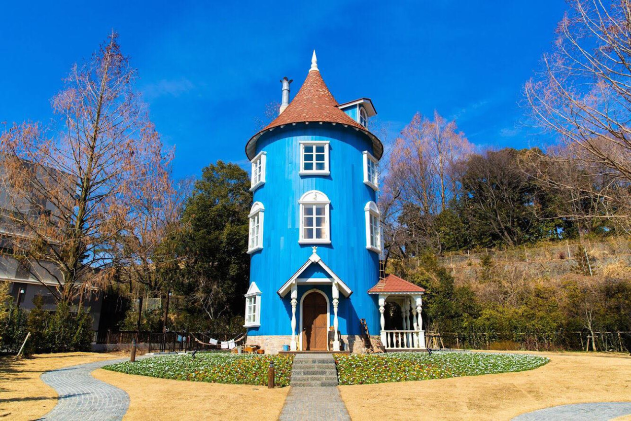 Explore the whimsical charm of Moominvalley Park featuring the iconic Moomin House. Enjoy delightful cafes and unique shops while immersed in the lovable world of Moomintrollen.