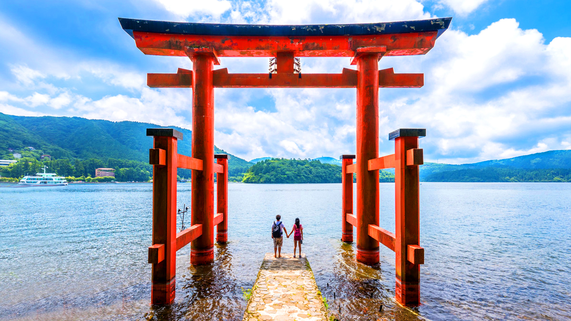 Discover the stunning beauty of Lake Ashi framed by the iconic Hakone Torii Gate where serene waters and majestic mountains create the perfect backdrop for unforgettable memories.