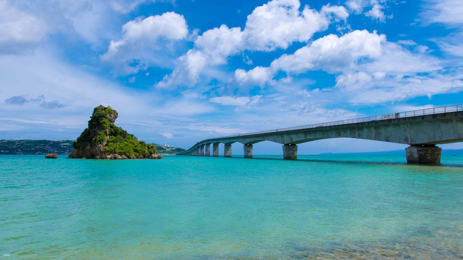 Discover stunning coastal views and clear turquoise waters connecting Kouri Island and the mainland perfect for soaking in Okinawa's natural beauty while exploring local culture.