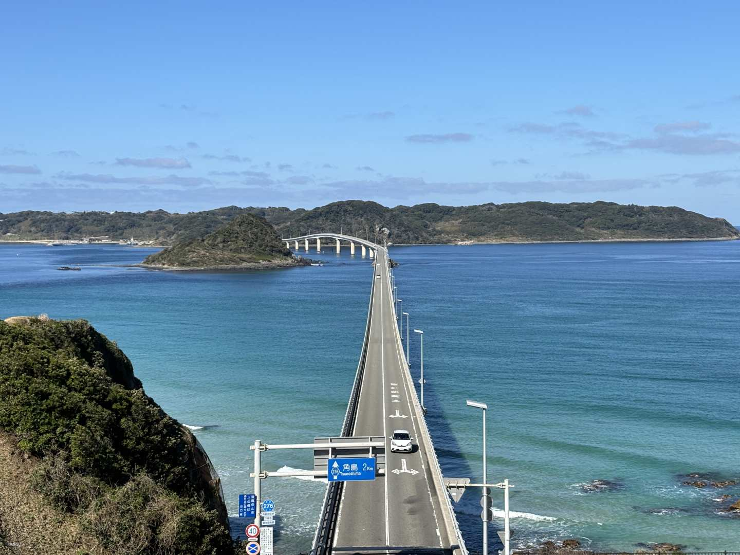 Experience stunning views from Tsunoshima Observatory where the bridge meets the island amidst the blue sea perfect for creating unforgettable travel memories in Japan.