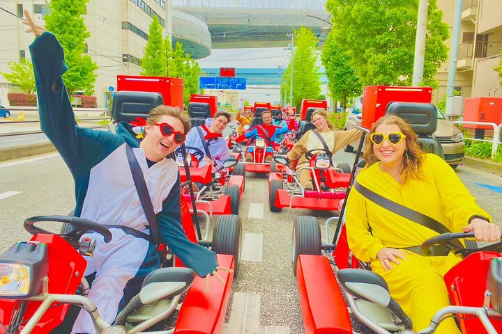 Experience the thrill of cruising through Tokyo's streets in colorful go-karts dressed as your favorite characters creating unforgettable memories alongside fellow adventurers.