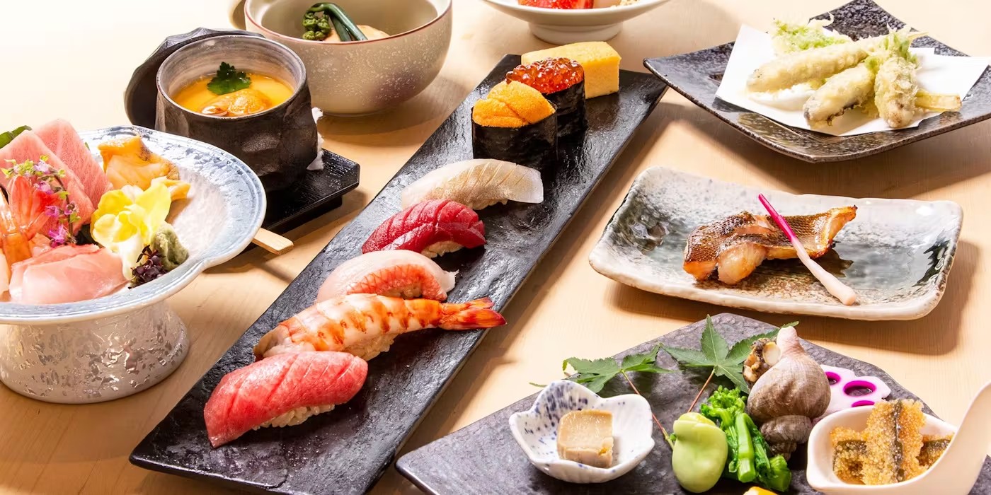 Experience the art of Edomae sushi in a luxurious Japanese setting where expertly crafted dishes and fresh seafood delight your senses complemented by an exquisite selection of sake and wine.