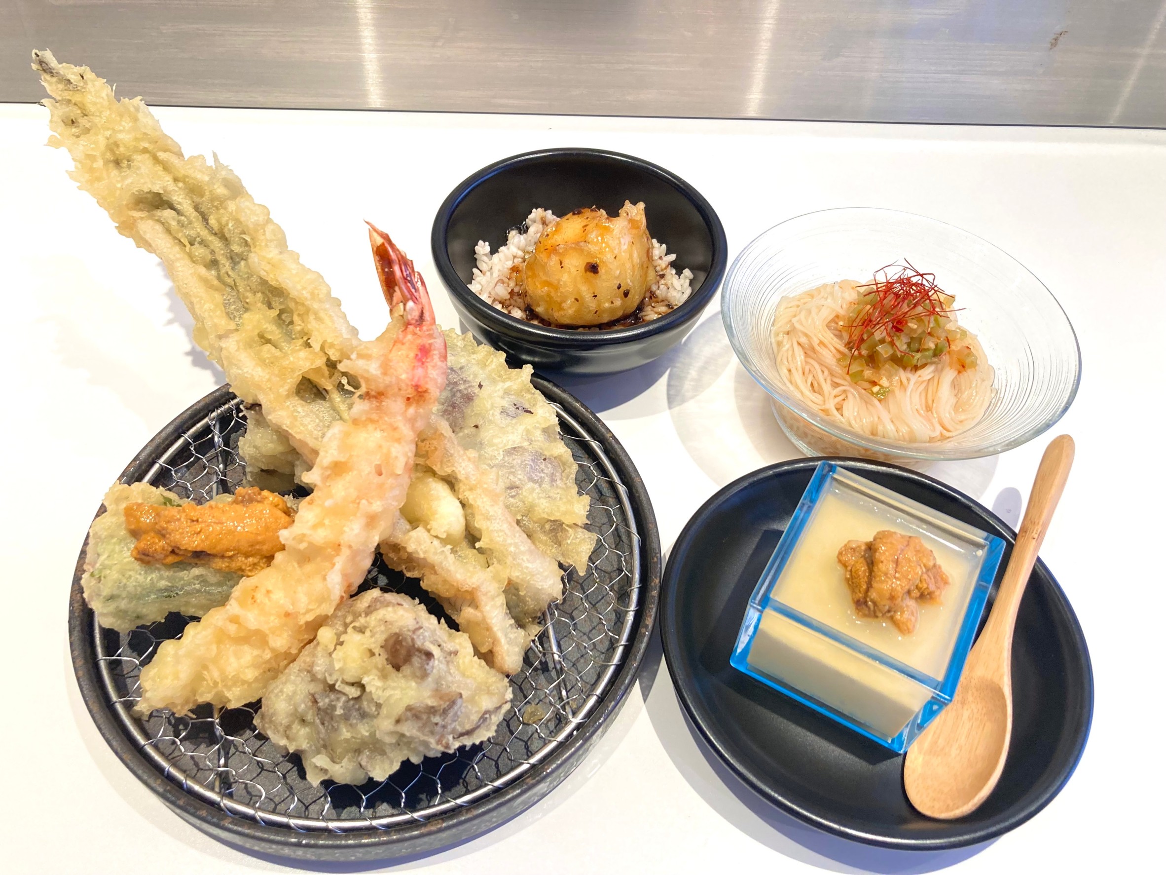 Savor a delightful tempura course featuring premium ingredients like prawns and Wagyu beef all served in a chic setting complemented by fine drinks and friendly service.