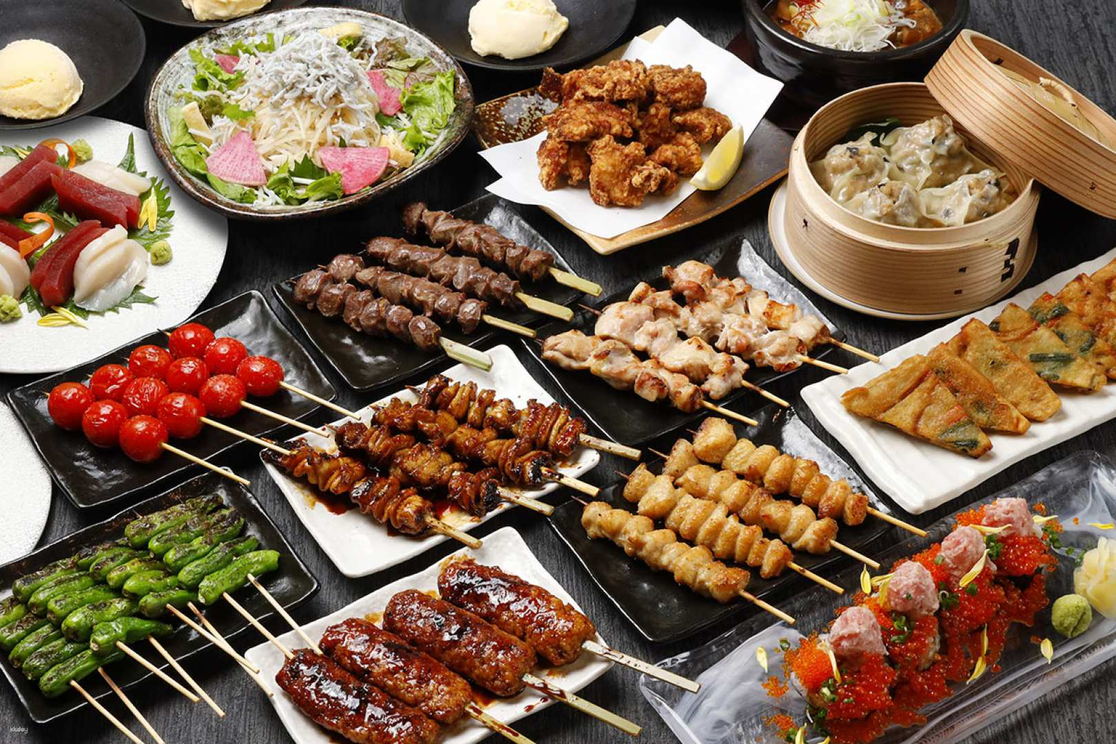Savor the essence of Japanese cuisine with a delightful spread of yakitori and local delicacies just a quick stroll from Shibuya Station. A true culinary adventure awaits!
