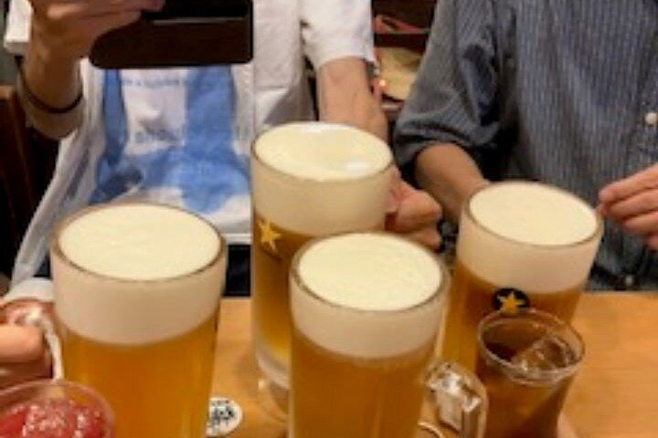 Cheers to new experiences! Savor local dishes and refreshing drinks in Osaka-Kyobashi where authentic dining and lively conversations create memorable moments in this culinary delight.