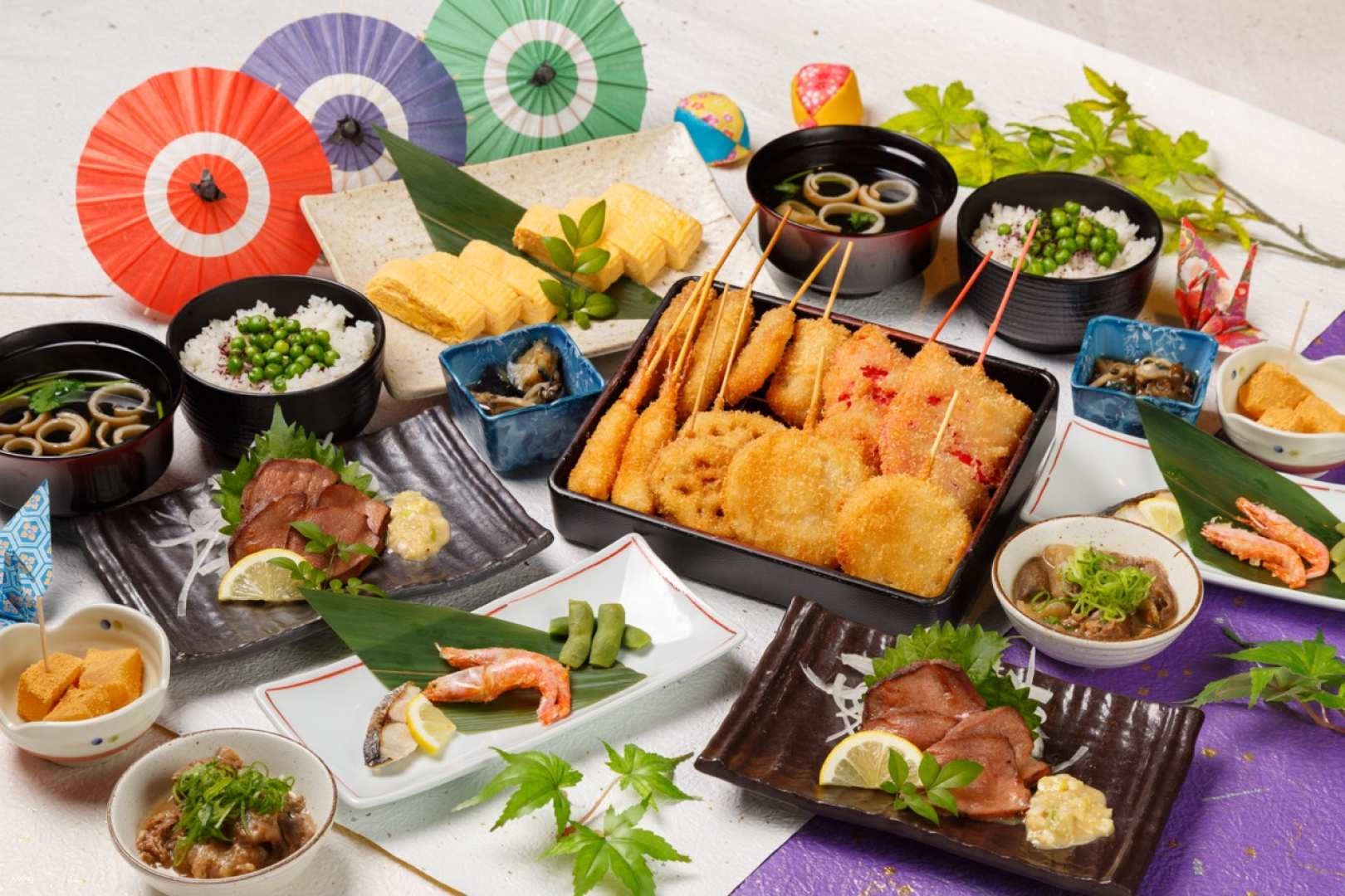 Experience the charm of traditional dining in Osaka with expertly crafted kushiyaki skewers seasonal ingredients and Kuroge Wagyu beef all served in a serene picturesque setting.