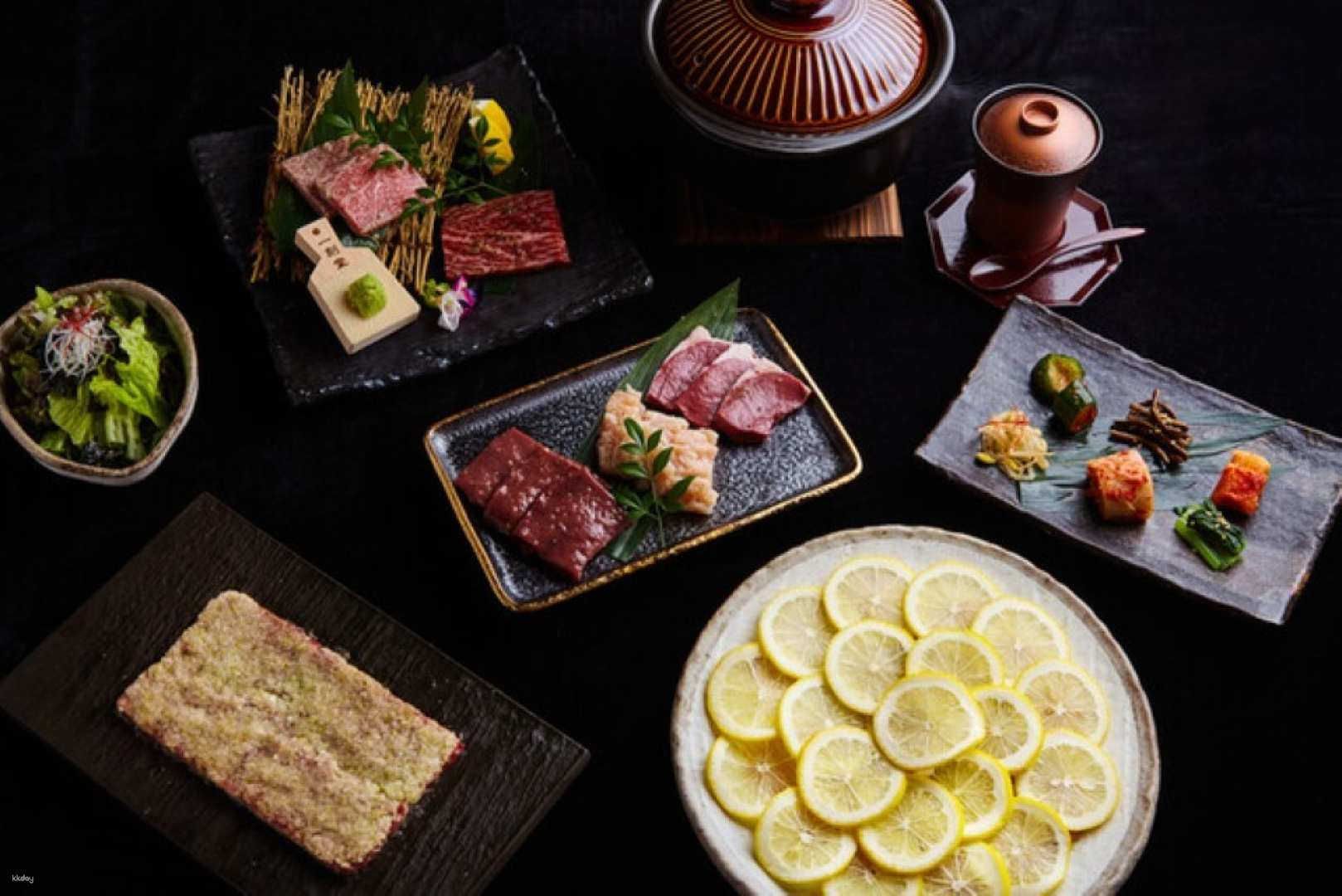 Indulge in a culinary adventure where rare beef cuts and the signature Super Green Onion Salted Beef Tongue create an unforgettable dining experience in Osaka's cozy setting.