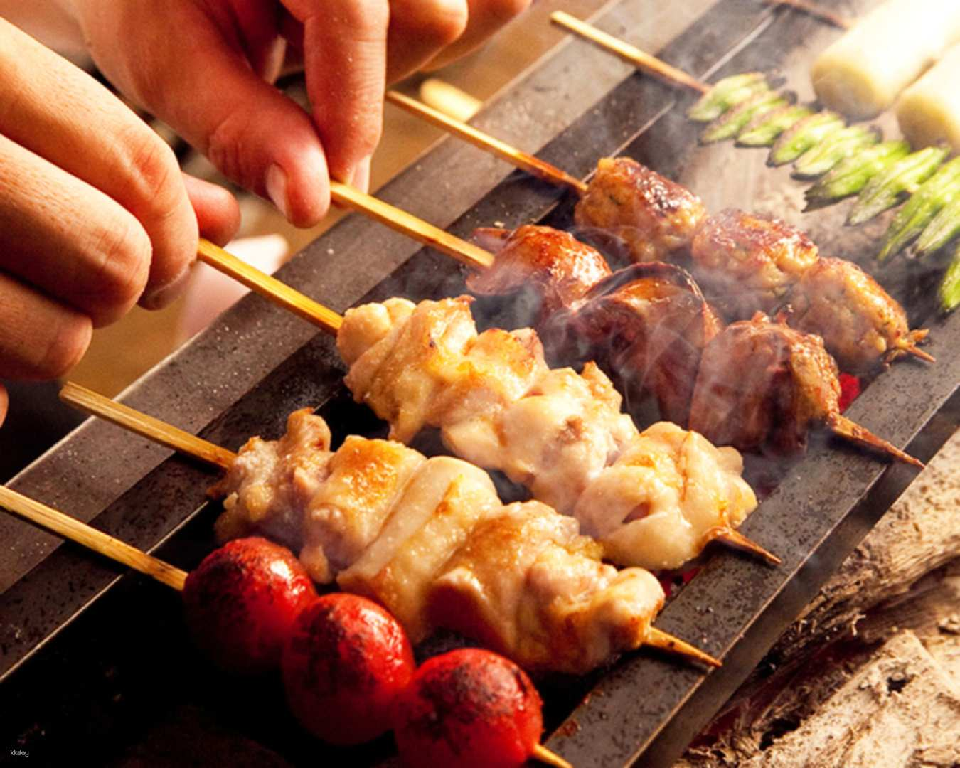 Savor the essence of Osaka with expertly grilled bird dishes over binchotan charcoal perfect for celebrations with friends or an intimate dinner all just steps from the station.