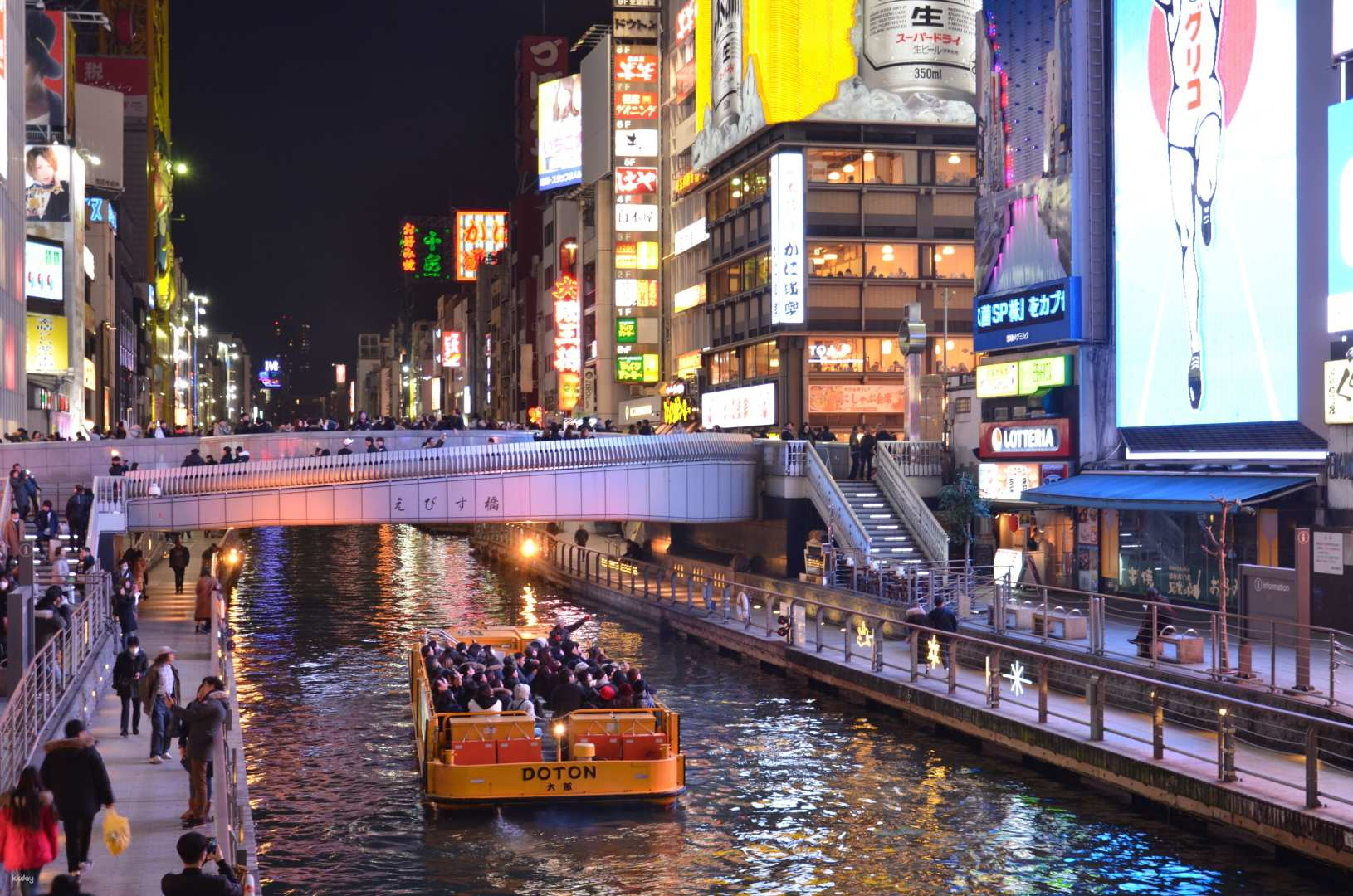 Glide along the Dotonbori River soaking in the dazzling neon lights and lively surrounding shops all while enjoying a delightful mini cruise that showcases the charm of Osaka Minami.