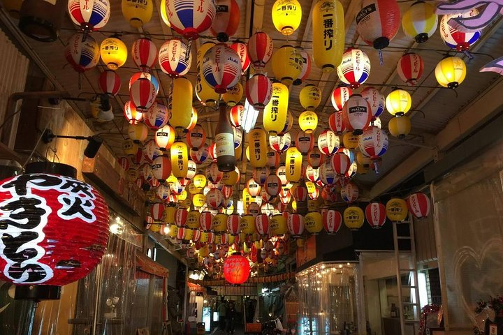 Experience the charm of Osaka's nightlife filled with colorful lanterns bustling streets and the delightful aroma of street food making every evening an adventure for all.