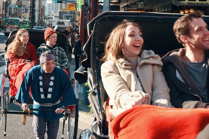Explore Osaka's sights on a unique journey blending taxi rides and charming rickshaw adventures. Enjoy historical landmarks bustling streets and delightful company creating memorable moments throughout the city.