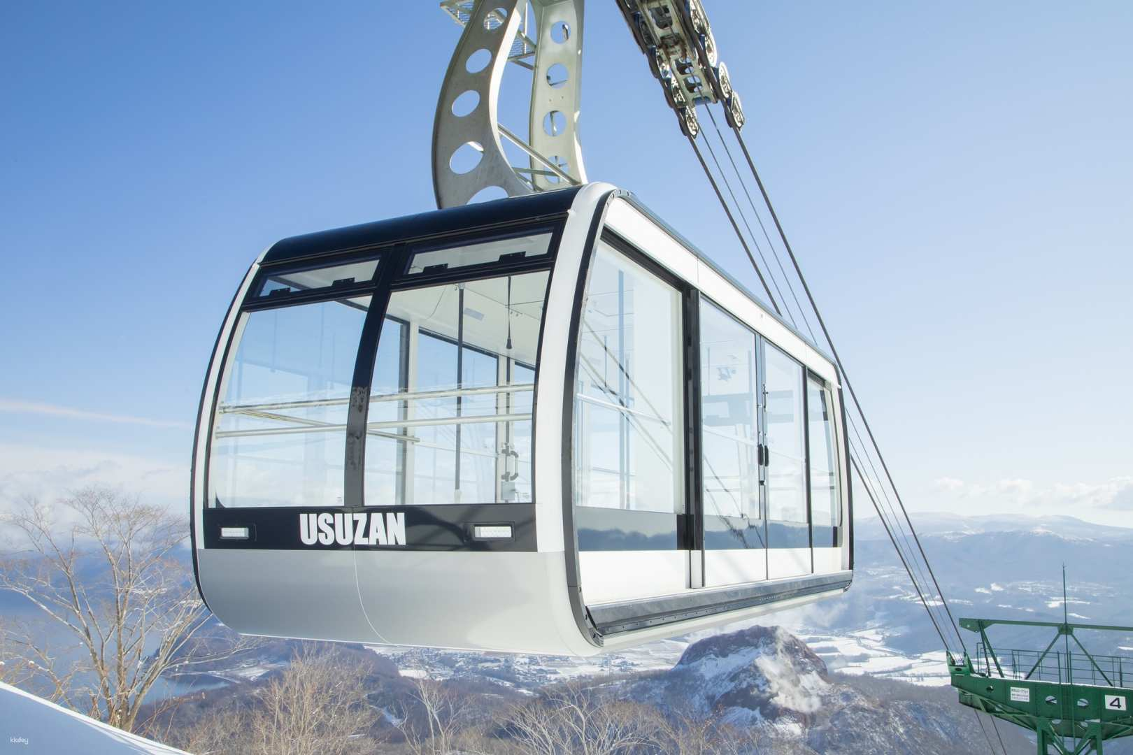 Experience breathtaking views of Hokkaido from the Mt. Usu Cable Car featuring transparent floor-to-ceiling windows that enhance your journey through the stunning landscape. Enjoy exclusive meal and souvenir discounts.