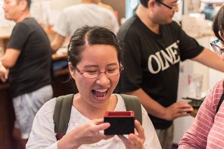 Experience the joy of discovering sake as you engage in delightful tastings with fellow enthusiasts enhancing your palate while savoring perfectly paired Japanese snacks in the heart of Tokyo.
