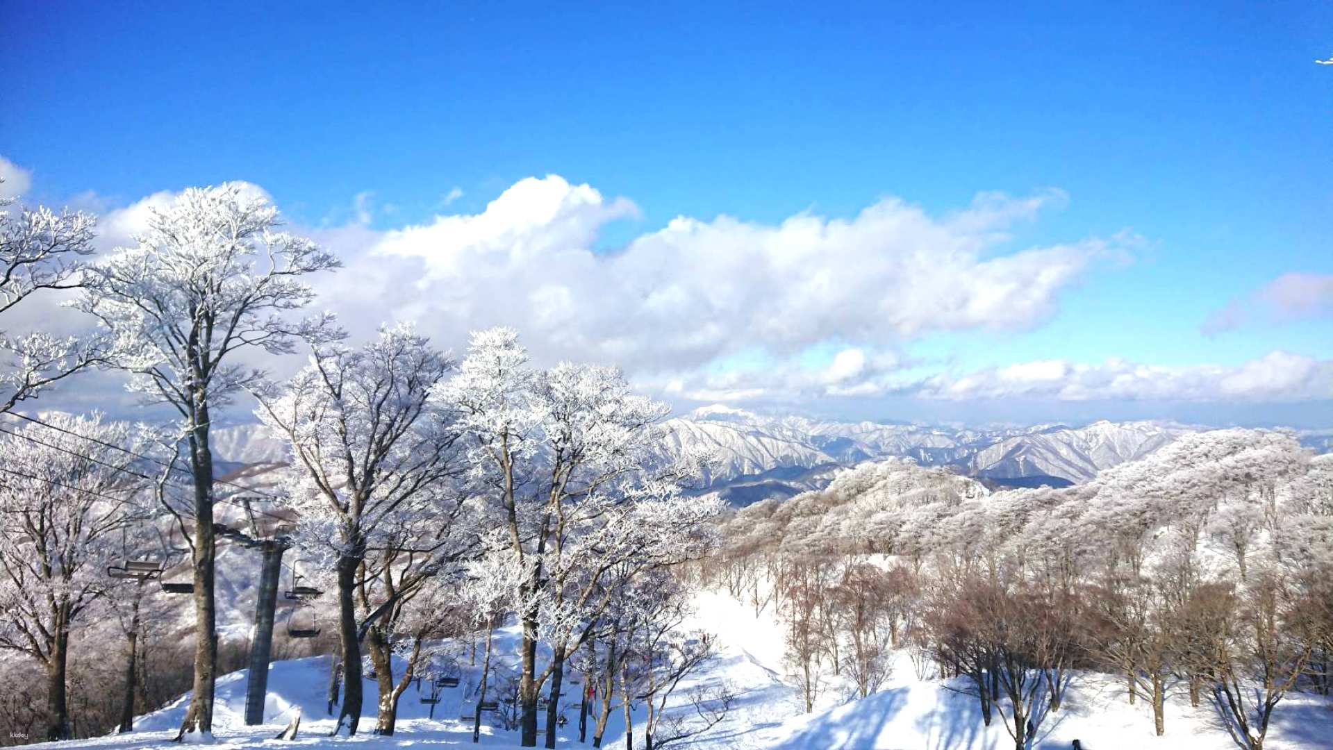 Experience the serene beauty of snow-covered mountains and crisp air at Ibuki perfect for snow sports and shopping adventures at Mitsui Outlet Park Shiga Ryuo. An ideal winter getaway!